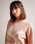 ELSSIAA-Knitwear-ELSSIAA is the perfect thing to throw on over a simple tee and jeans, or wear under a coat in cooler weather. The jumper has a boxy fit and ribbed trims, with a crew neckline and raw hemline to finish the look. Jumper Jacquard logo design Boxy fit Long sleeved Ribbed trims Raw hemline Crew neck Julia is 5'10" / 1.78m and wears Pink in a Ted size 1- Ted Baker Romania